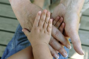 hands stacked on top of one another