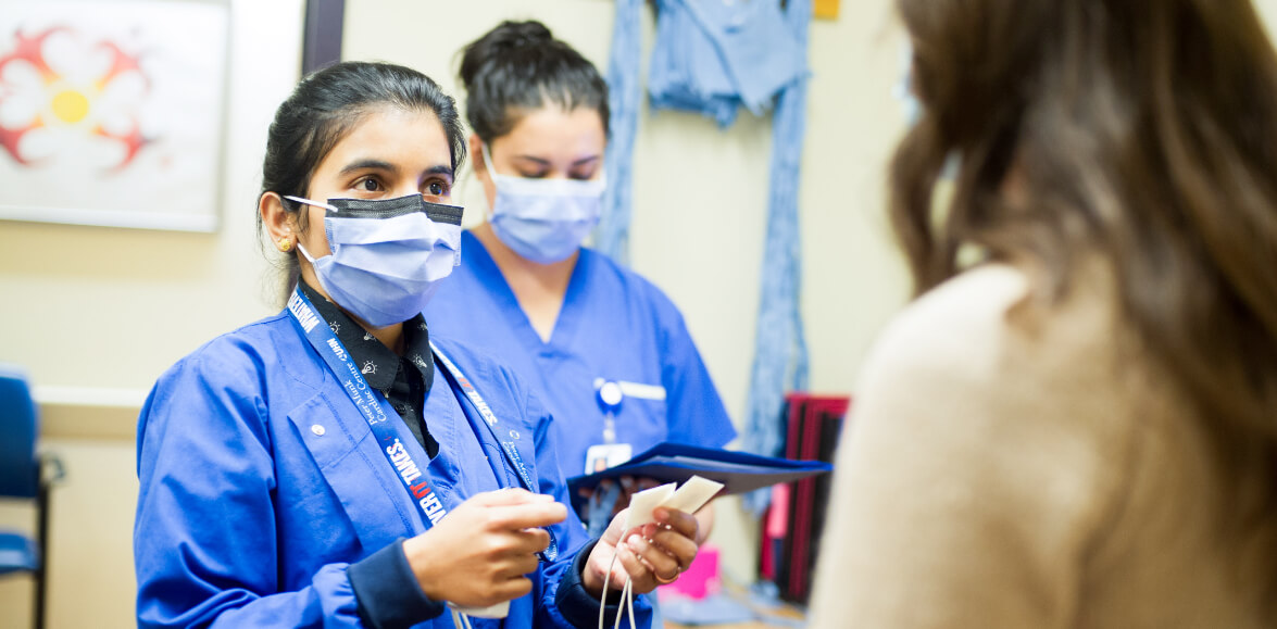 Clinician talking with patient